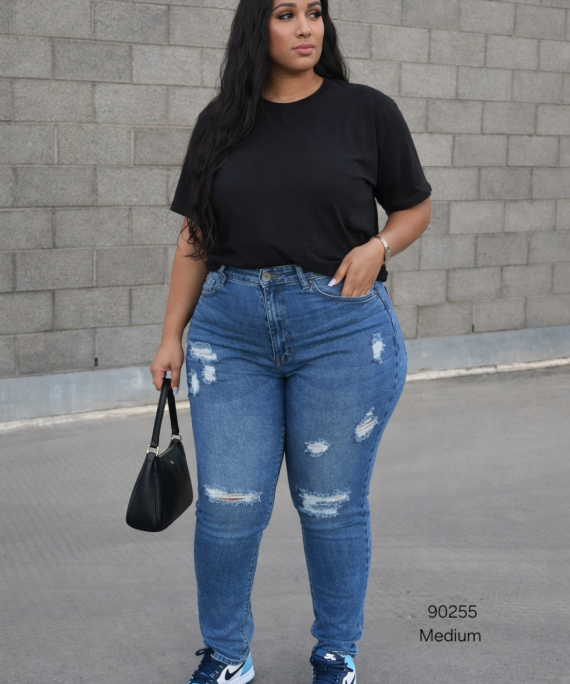 JEANS SKINNY CON ROTICOS